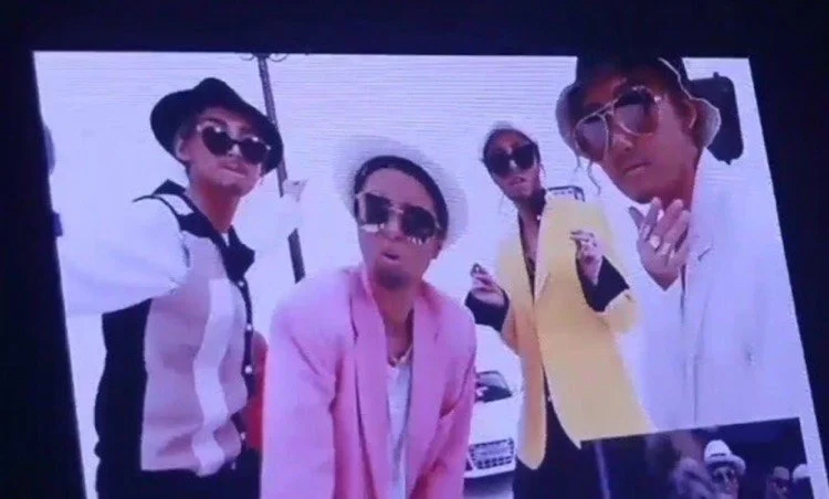  Depicted is Mamamoo, a K-Pop group, wearing blackface in a video as part of their concert in Seoul  Image Courtesy of  Digital Music News  